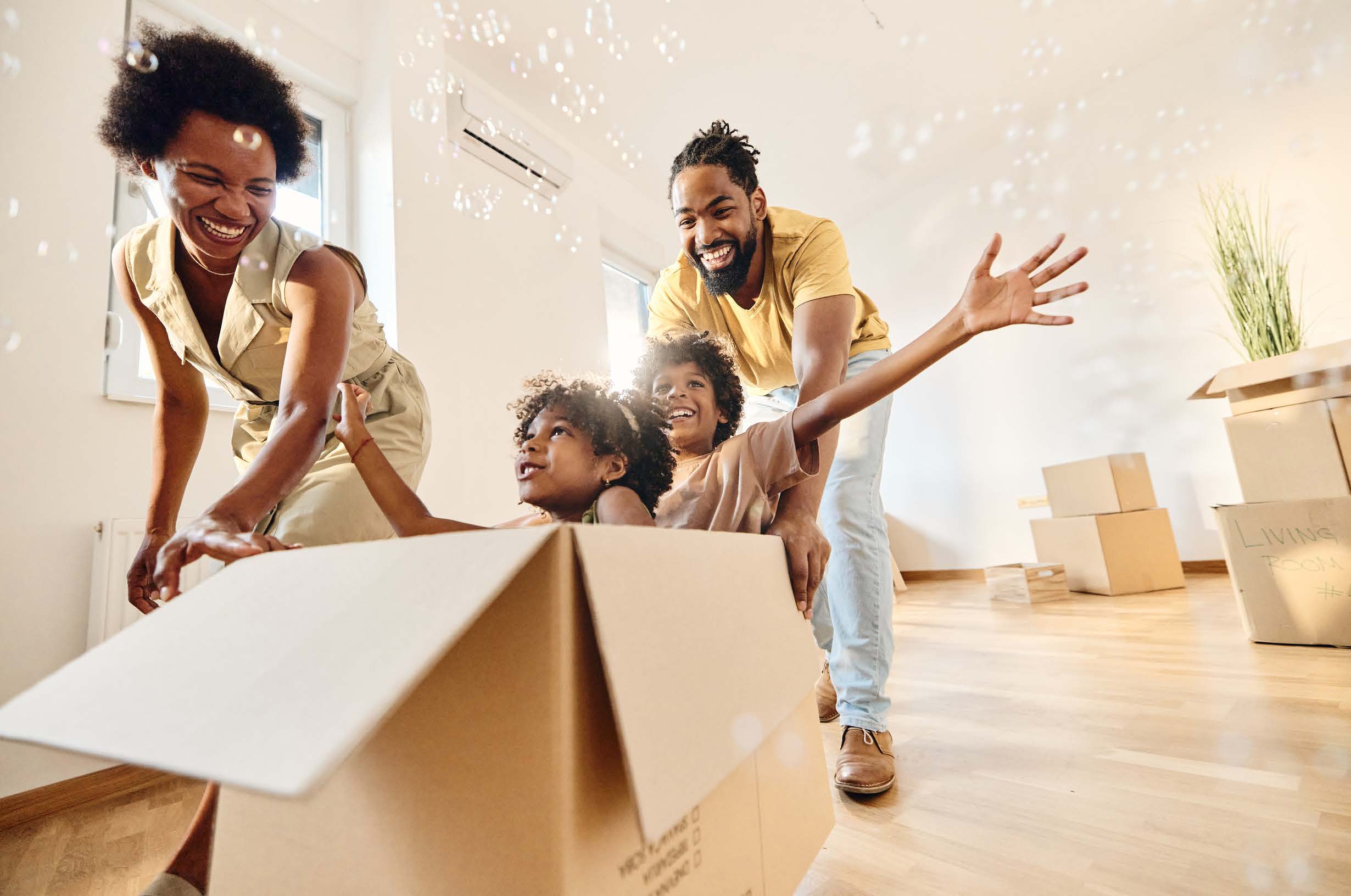 Family having fun in new home